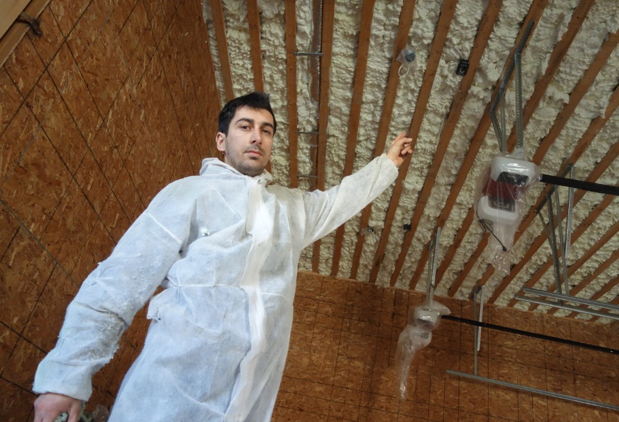 George proudly shows garage ceiling spray foam 