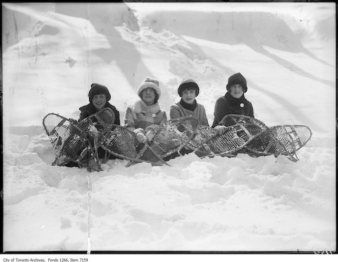 High Park, snowshoes, seated in snow, backlight. - February 19, 1926
