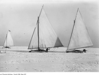 Toronto Winter Photographs Iceboats, Toronto Bay. - [between 1906 and 1910] - photograph of three iceboats racing a car (not shown) on frozen Toronto Bay.
