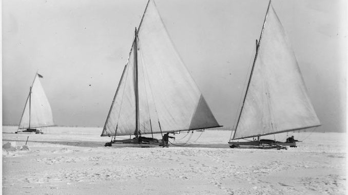 Toronto Winter Photographs Iceboats, Toronto Bay. - [between 1906 and 1910] - photograph of three iceboats racing a car (not shown) on frozen Toronto Bay.