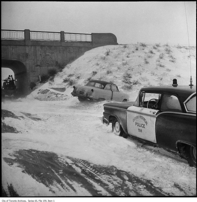 OPP cars in the snow. - 1960 - photographs of OPP (Ontario Provincial Police) cars in the snow.