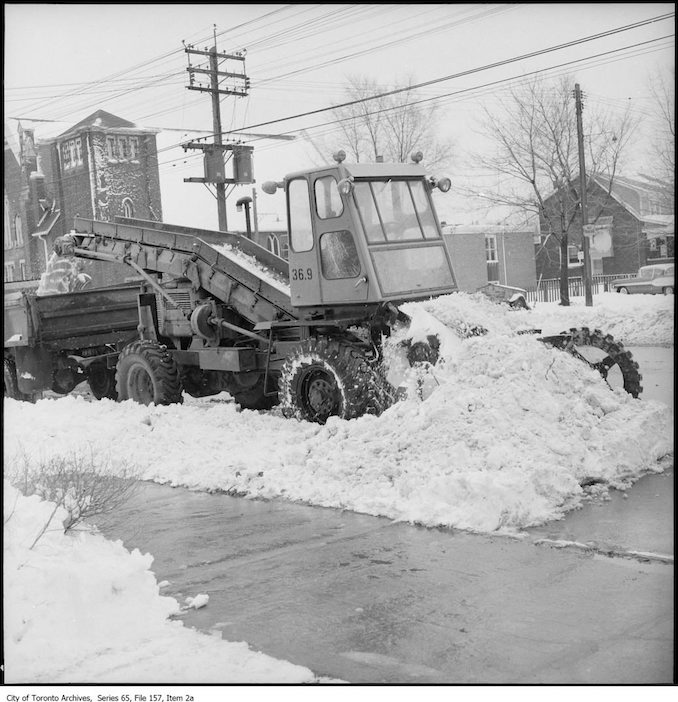 Snow removal equipment and workers. - 1960