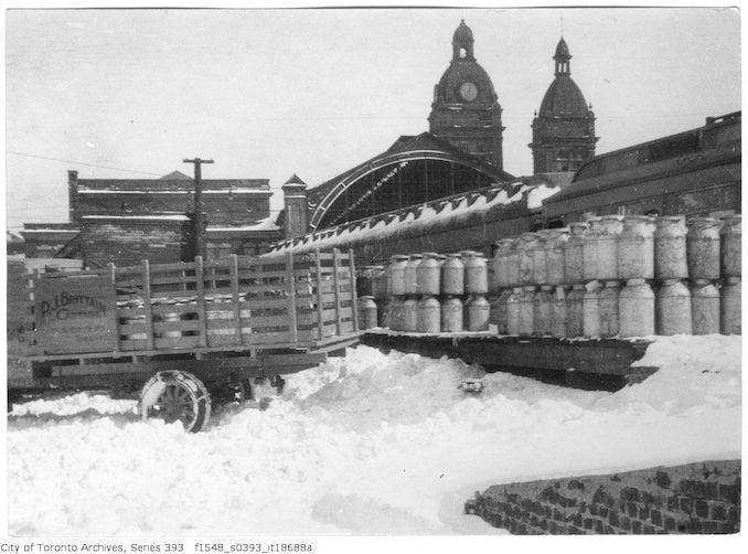 Union Station milk cans in snow - 1924