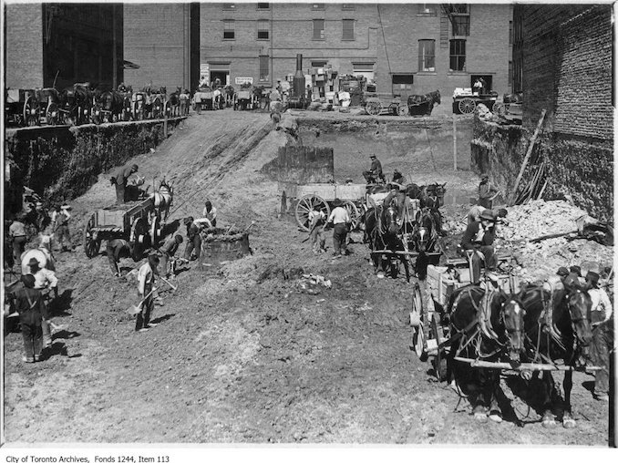 c. 1903 - Preparing for foundations for new George J. Foy building, Front Street. The business sold wholesale liquors and cigars.