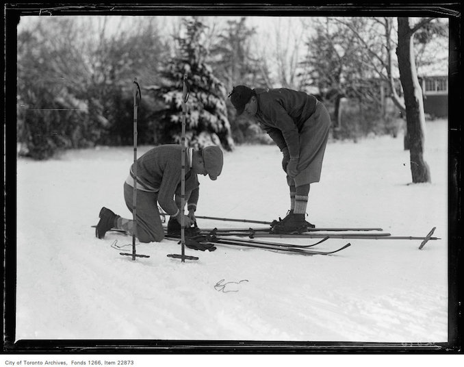 Rosedale Golf [Course], skiers adjusting straps January 7, 1931 - vintage skiing photographs