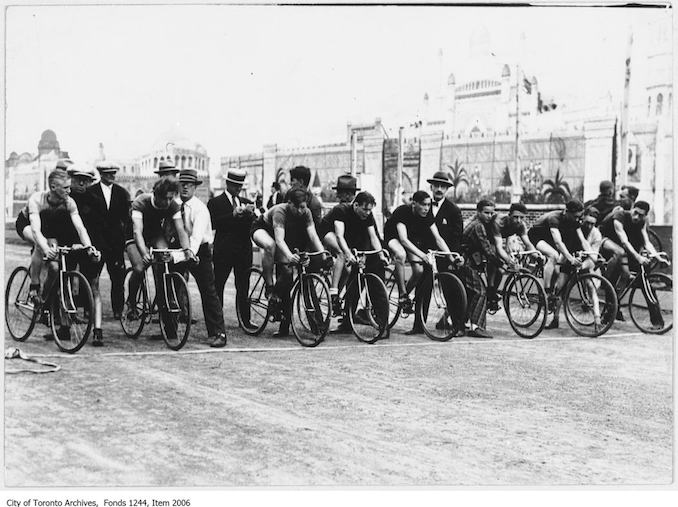 Start of bicycle race, CNE . - September 2, 1926. The winner of the one mile race was Bill Elder, third from left. - Vintage Bicycle Photographs