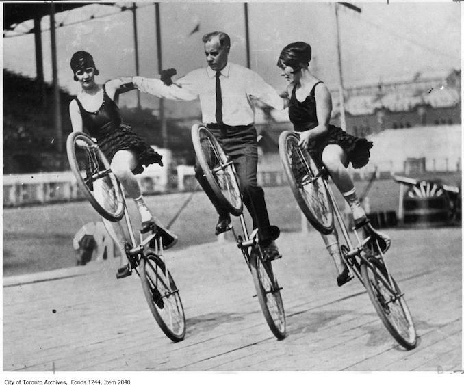 Trick cyclists at CNE Grandstand. - [ca. 1920] - Vintage Bicycle Photographs