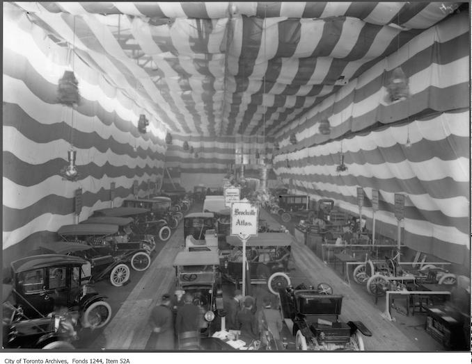 Auto show at Armouries, showing electric car (left). - 1912