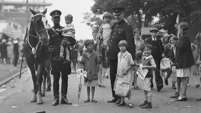 CNE, Kids Day, mounted officer and foot constable with lost kids. - August 27, 1929
