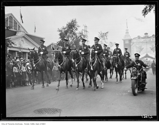 CNE, luncheon group, Warriors' Parade, mounted police. August 23, 1930