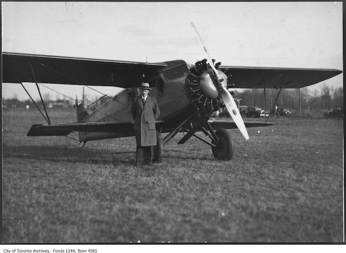 Captain Earl Hand and his Buhl Airsedan airplane. - 1928