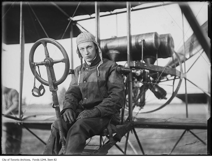 Charles F. Willard sitting in plane. - [1910?]