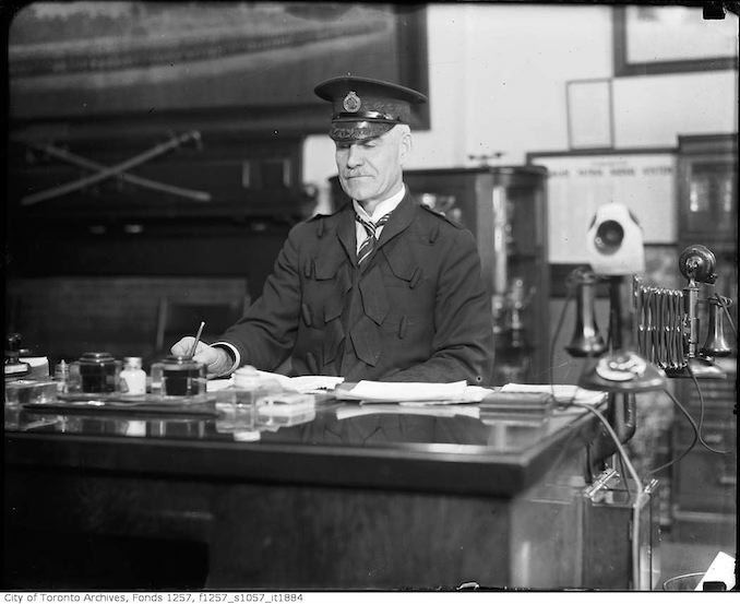 Chief Constable Samuel Dickson at desk in station