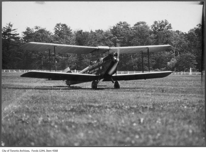 Cirrus Moth airplane . - 1929 - photograph. A note says it was the first plane to arrive at Thorncliffe Racetrack for the TFC meet.