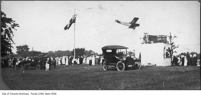 Curtis Jenny JN4 airplane doing stunts at Willowdale Flax Festival. - 1919 - photograph possibly taken at Jack Elliott's property in Willowdale.