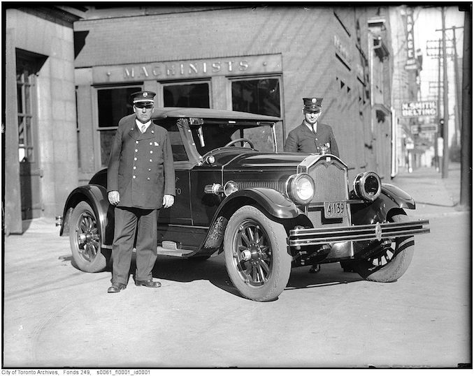 Toronto Fire Department photographs Deputy Chief George Sinclair and Buick car and driver, Adelaide Street 1928