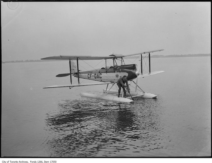 Indian Treaty flight, Captain Roy Maxwell paddling plane. - June 25, 1929