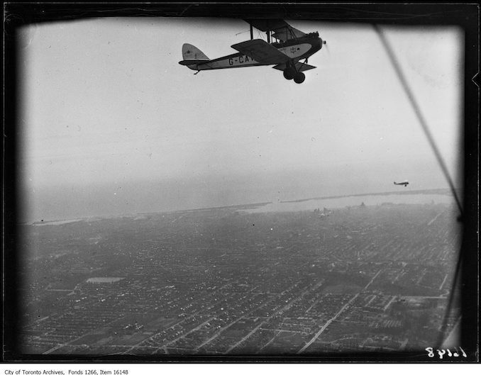 Leaside airdrome, moth plane G-CAVF in flight, one other. - April 10, 1929