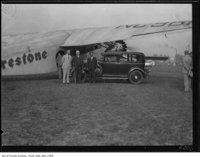 Leaside airdrome, plane, car, group. - September 4, 1929