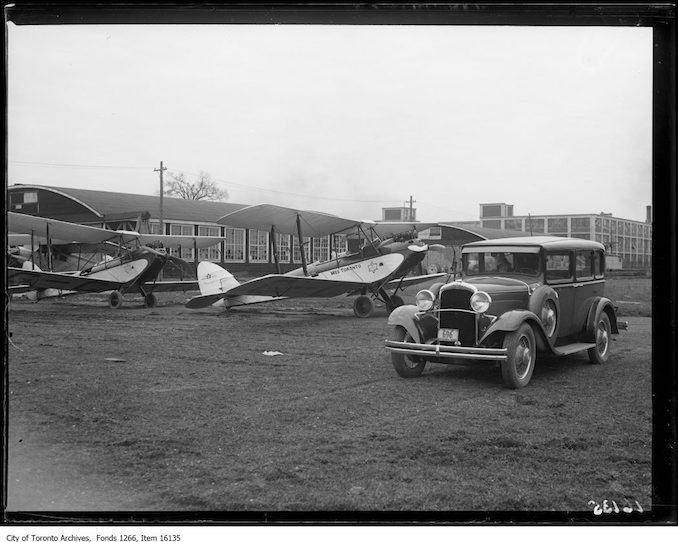 Leaside airdrome, planes and J.H. Boyd Dodge car. - April 10, 1929