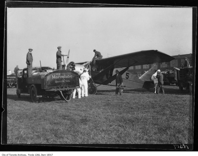 National Air Tour, refuelling plane, Imperial Oil truck. - October 5, 1929