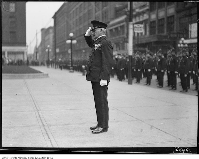 Police parade, Chief Draper at salute. - October 20, 1929