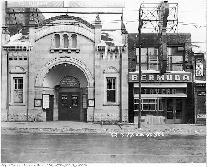 1950 - 379-383 Yonge Street, occupied by the Bermuda Tavern, 379 Yonge Street, and the Yonge Street Mission, 381-383 Yonge Street