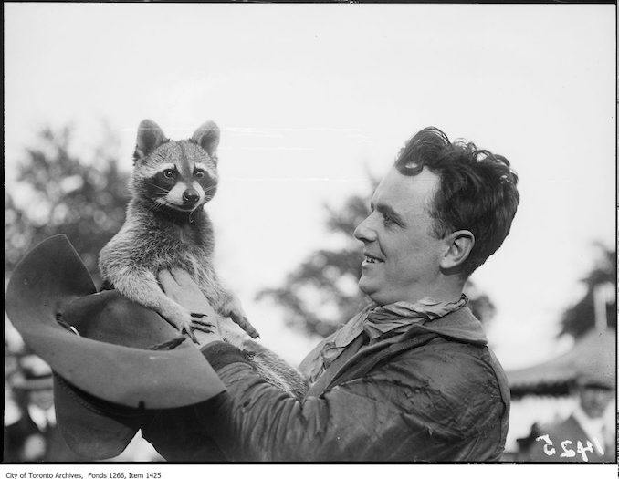 Exhibition, Tex Tressler and pet raccoon, back. - September 5, 1923