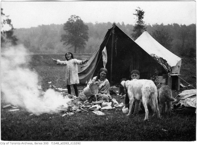 Gypsy camp showing a woman, children and dogs oct 12 1918