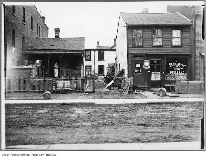 Lettering on restaurant window is partially in Hebrew. Photo appeared in the Toronto World, December 4, 1910, "Picturesque if not Artistic--Glimpses of 'The Ward'." - Chicken warehouse, Agnes Street - 1910? Vintage Restaurant Photographs