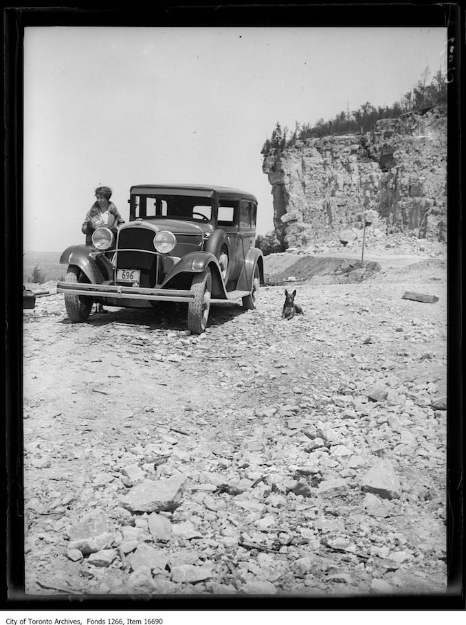 Milton (?), rock bluff and car, Marjorie Laing. - May 26, 1929