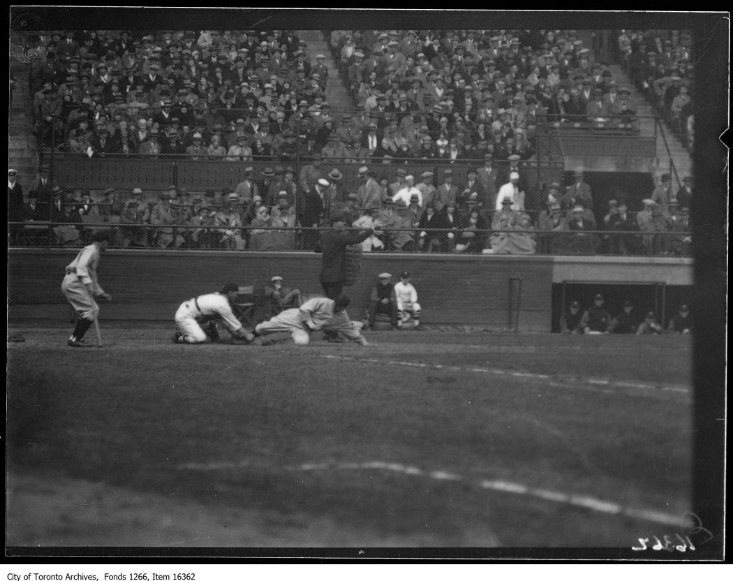 Opening ball game, Baltimore 1st run, slide at home. - May 1, 1929