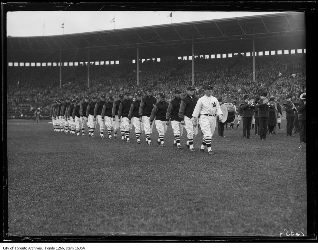 Opening ball game, Toronto team marching. - May 1, 1929