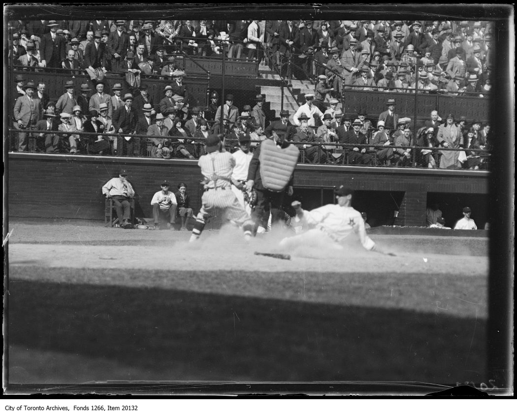 Opening ball game, slide at home plate. - May 6, 1930