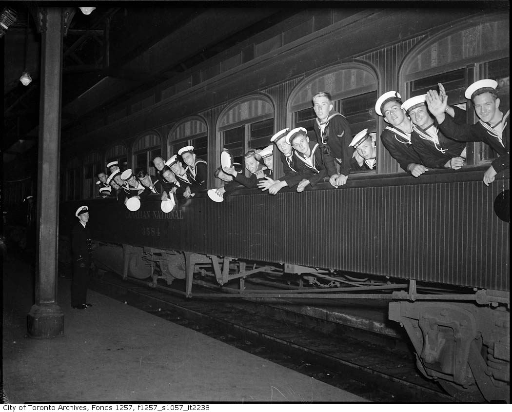 Sea Cadets on train in station - 194?