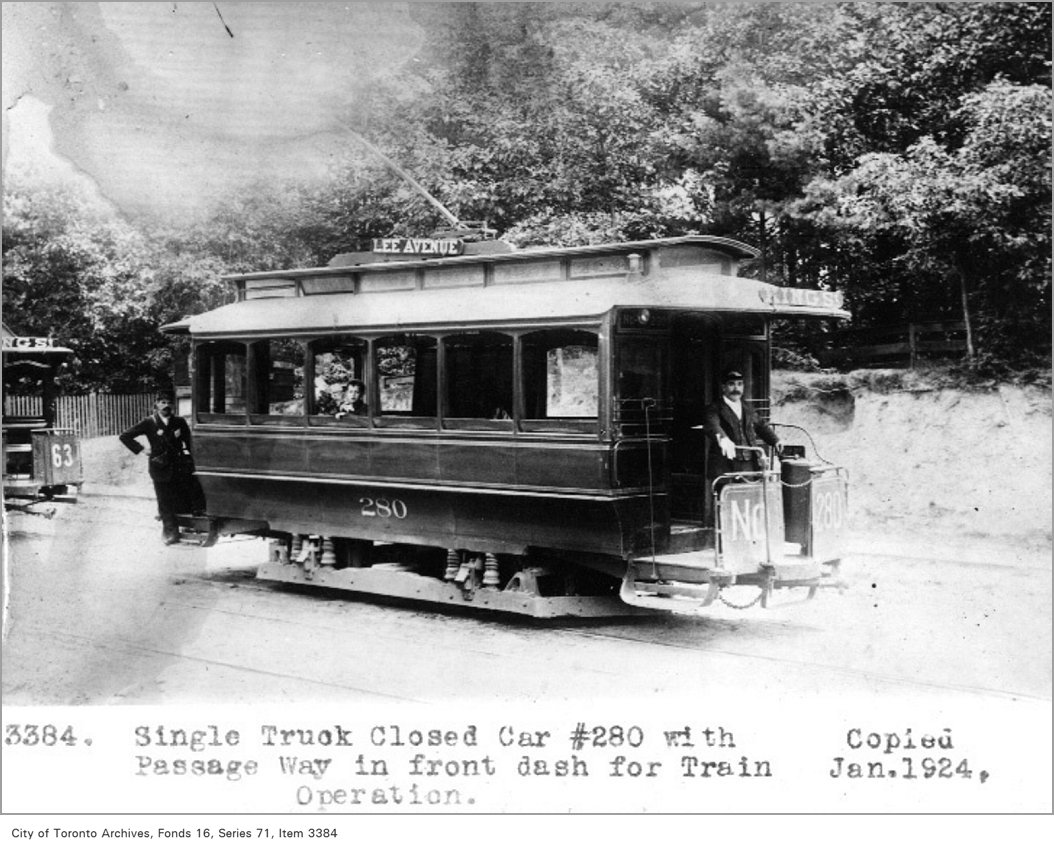 Single truck closed car #280, with passage way in front dash for train - 1894
