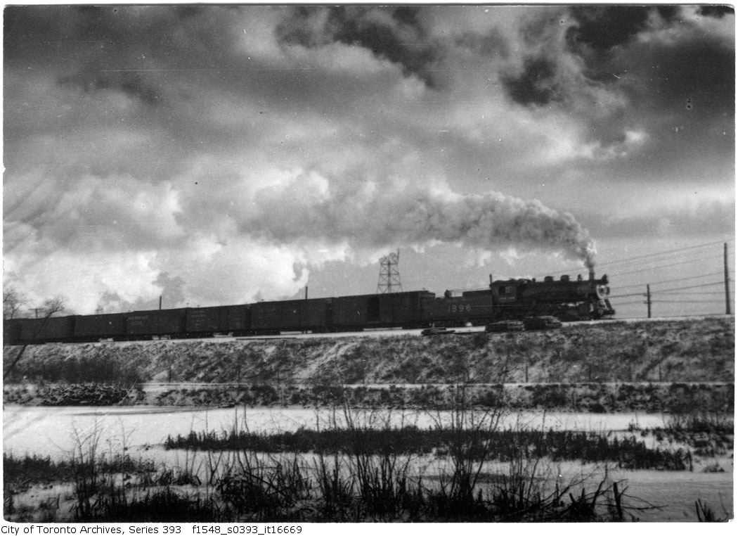 Train passing Catfish Pond - 1920