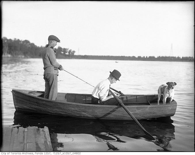 Two men in boat, fishing 193? - Vintage Animal Photographs