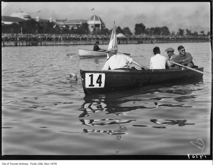 1928 - C.N.E., Men's Swim, Georges Michel swimming by boat