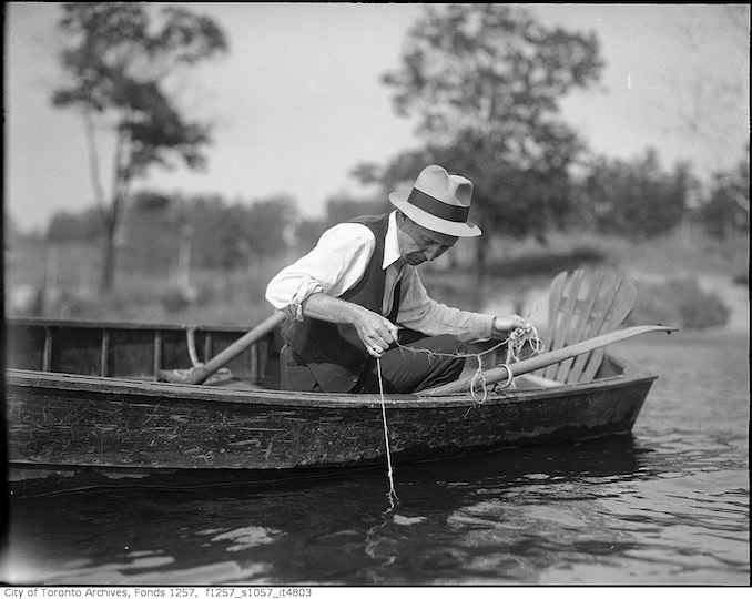 193? - Two men in boat, fishing - Toronto Guardian