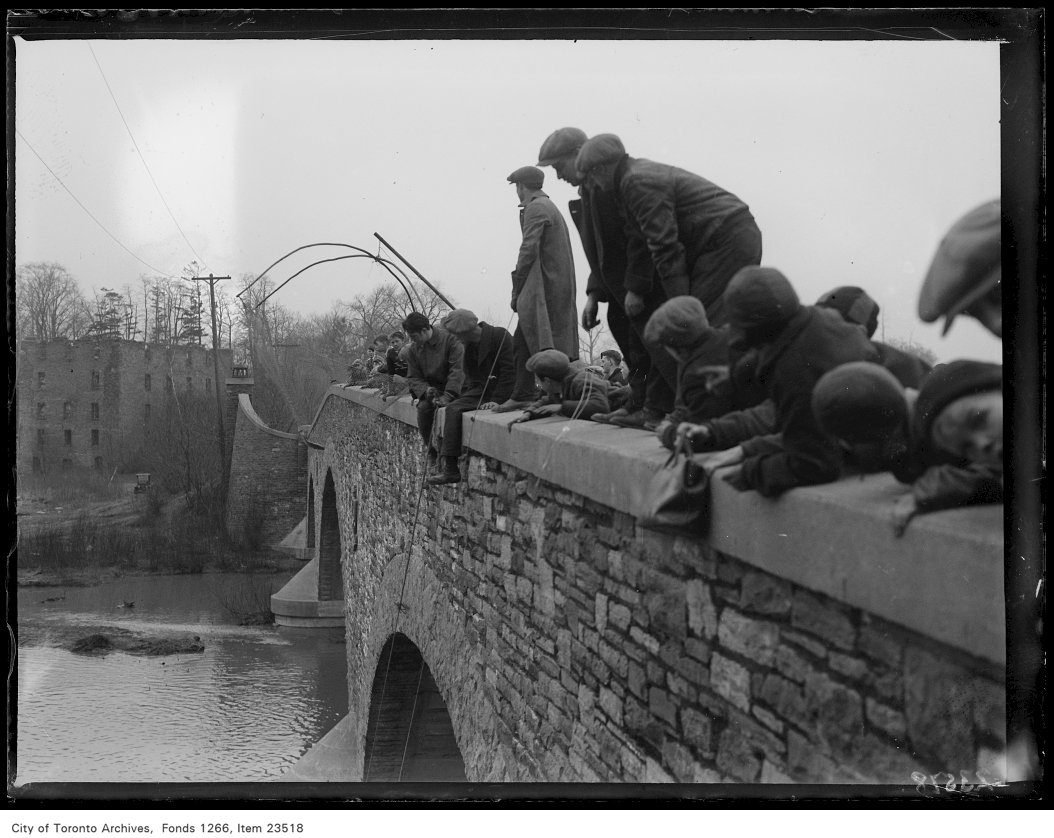 1931 - April 3 - Good Friday scenes, sucker fishing from old Bloor Street bridge - Vintage Fishing Photographs