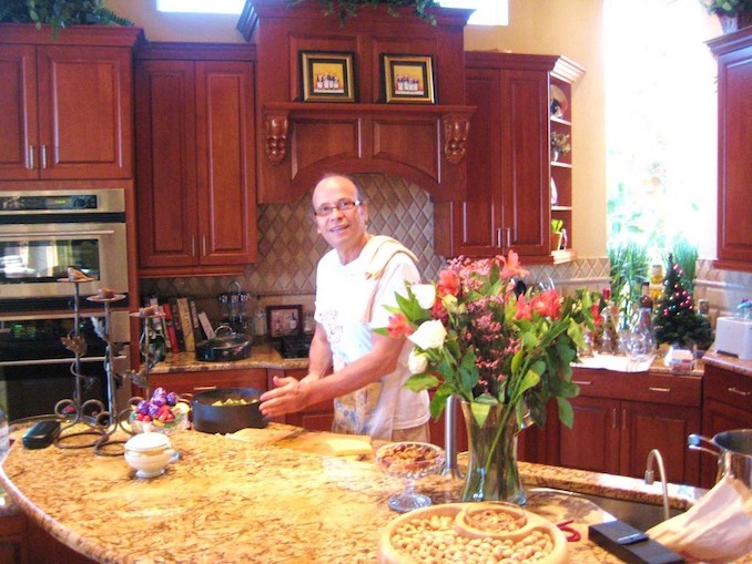 This is me cooking in my kitchen, where I love to prepare simple, traditional Italian dishes for friends and family