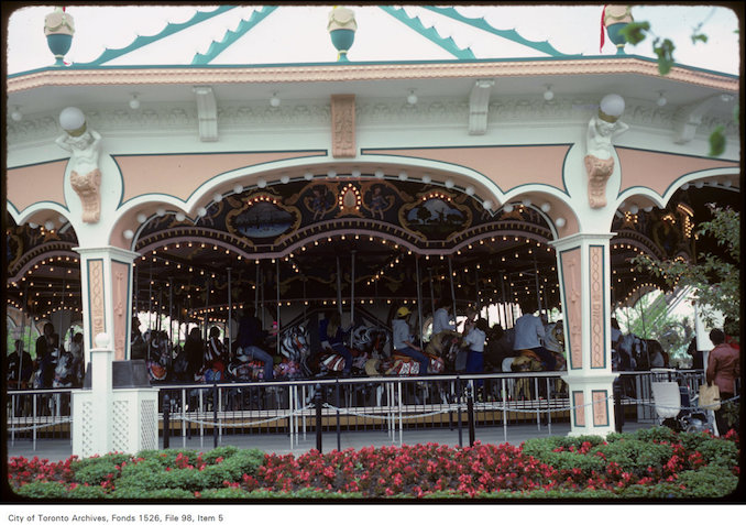 1981 - June 8 - View of carousel and surrounding flower beds at Canada's Wonderland