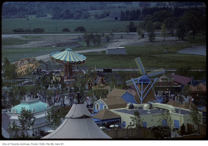 1981 - june 8 - View of flying swing ride, windmill and other rides on Canada's Wonderland grounds