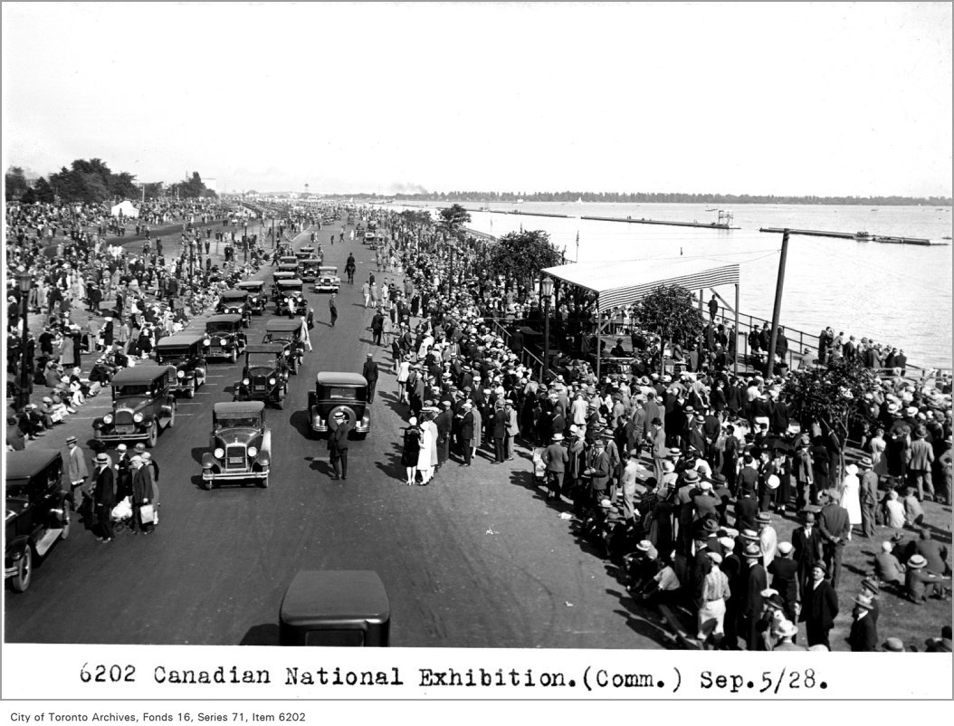 1928 - looking east on Lakeshore Blvd. south of Ontario Government Building showing crowds assembling for waterfront show at CNE