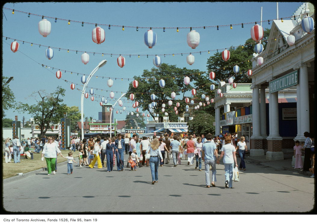 1974 - View of crowd on CNE grounds in front of Horticulture Building