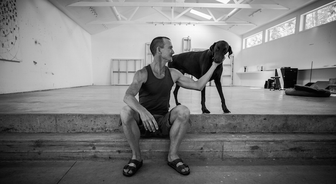 Saying hello to a common studio visitor, his dog Aloe - Kirk Mechar