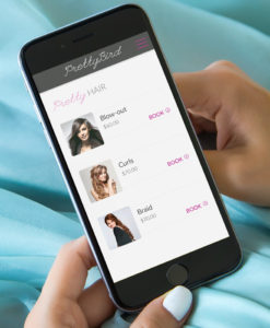 PrettyBird app on phone in hand, on-demand beauty support