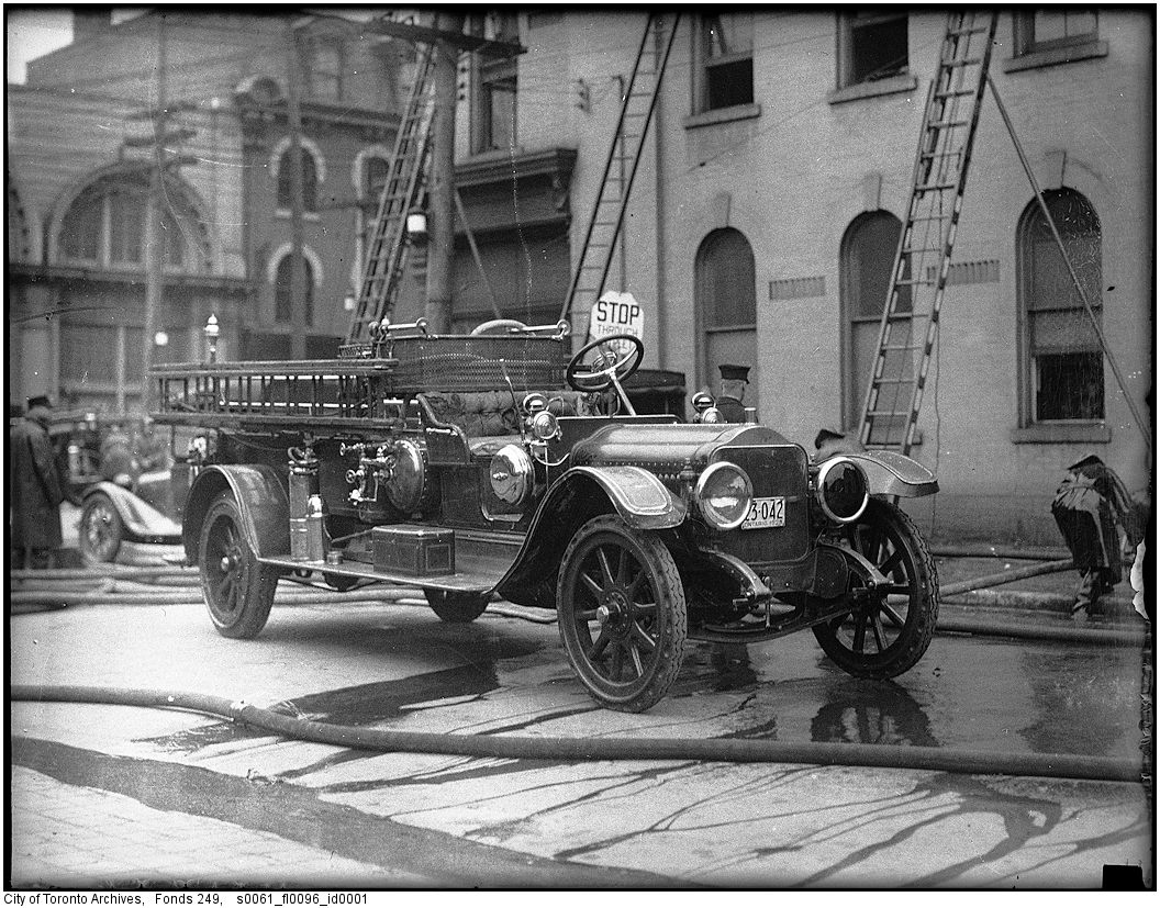 1927-1940 - White hose and combination truck, possibly No. 6, at 2nd-alarm fire, Jarvis and Richmond streets