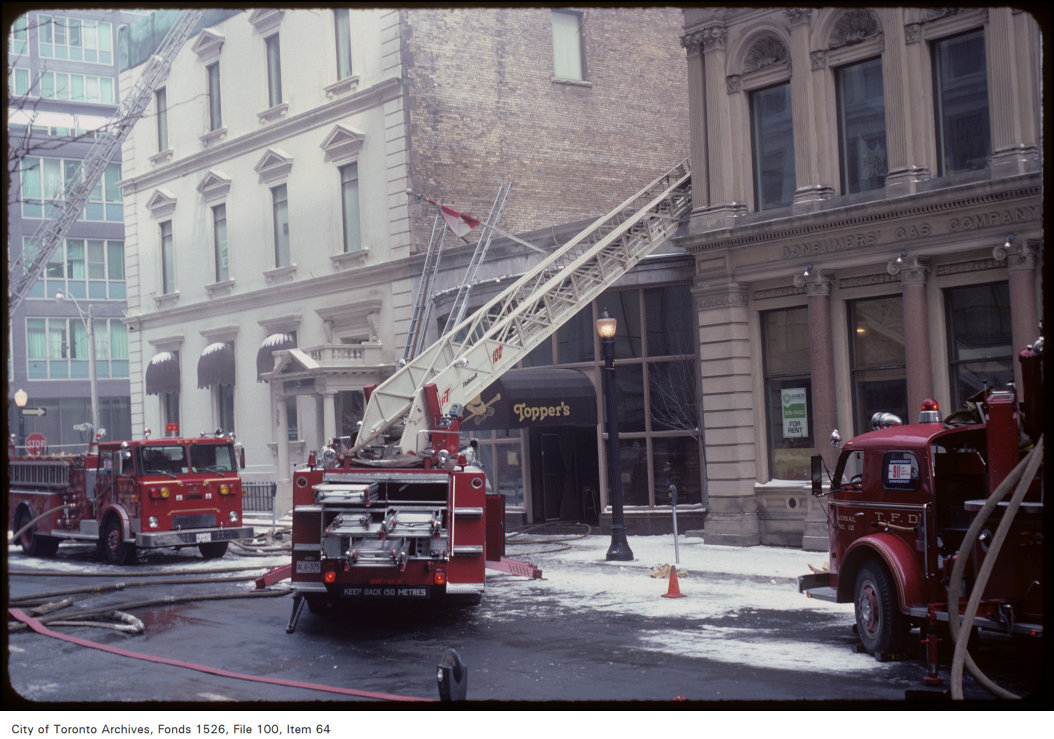 1982 - View of fire truck and ladder at Adelaide Street East and Toronto Street